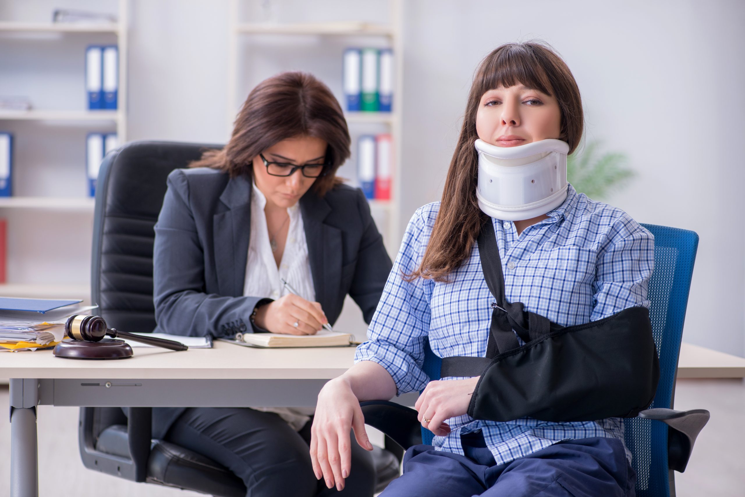 Top 6 Mistakes to Avoid When Purchasing Liability Insurance Insurance agent explaining about the liability insurance to injured woman